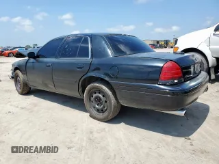 2010 Ford Police Interceptor with VIN 2FABP7BV9AX110091, listed as a Copart auction lot 60065205 with Not provided miles and Salvage title. Bid and sale history available at DreamBid. Image 2.
