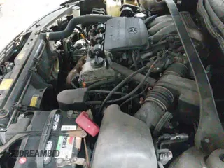 2002 Toyota Solara SE with VIN 2T1CF22P22C590504, listed as a IAAI auction lot 41593132 with 212,429 mi miles and . Bid and sale history available at DreamBid. Image 12.