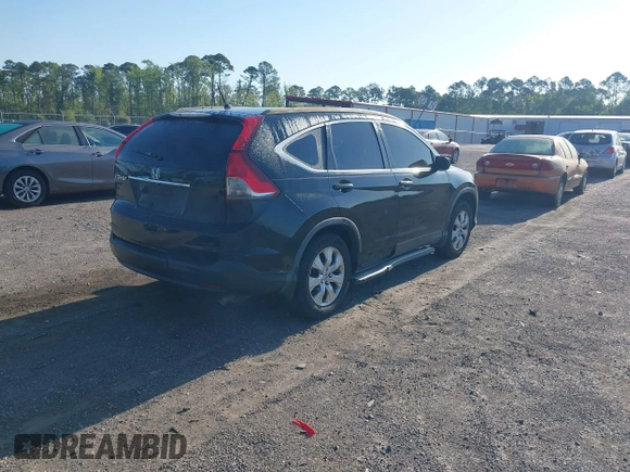 2014 Honda CR-V LX with VIN 3CZRM3H37EG710537, listed as a IAAI auction lot 42035744 with 279,482 mi miles. Bid and sale history available at carsss.com. Image 4.