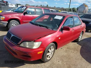 2002 Mitsubishi Lancer LS with VIN JA3AJ36E82U063279, listed as a IAAI auction lot 41711543 with 39,127 mi miles. Bid and sale history available at carsss.com. Image 2.