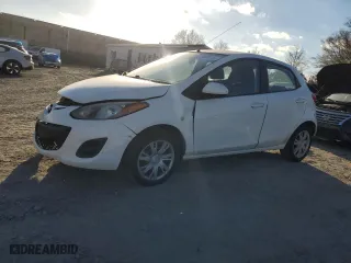 2014 Mazda Mazda2 Sport with VIN JM1DE1KY2E0187504, listed as a Copart auction lot 79099724 with 88,807 mi miles and Salvage Title. Bid and sale history available at carsss.com. Image 1.