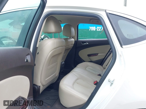 2014 Buick Verano with VIN 1G4PP5SK2E4145963, listed as a IAAI auction lot 42104486 with 121,151 mi miles. Bid and sale history available at carsss.com. Image 8.