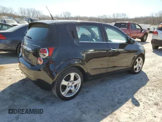 2012 Chevrolet Sonic LTZ z VIN 1G1JE6SHXC4206797, wystawiony jako Copart lot #48520535 z przebiegiem 117 350 mil mil oraz Czysty tytuł • Clean title. Historia ofert i sprzedaży dostępna na DreamBid. Obrazek 3.