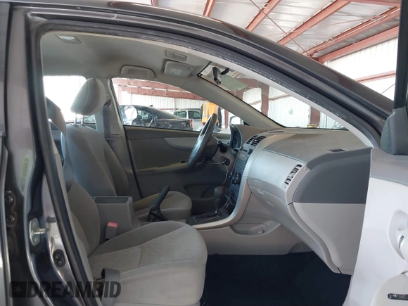 2009 Toyota Corolla with VIN JTDBL40E69J036916, listed as a IAAI auction lot 41776387 with 185,749 mi miles. Bid and sale history available at carsss.com. Image 5.