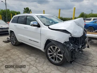 2017 Jeep Grand Cherokee Overland with VIN 1C4RJFCGXHC823593, listed as a Copart auction lot 58727205 with Not provided miles and Salvage title. Bid and sale history available at DreamBid. Image 4.