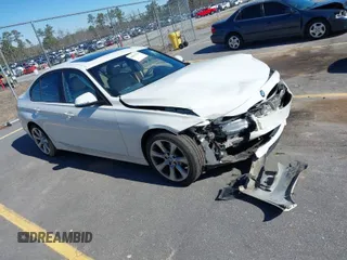 2014 BMW 3 Series 320i with VIN WBA3B1C50EK135458, listed as a IAAI auction lot 41631722 with 1 mi miles. Bid and sale history available at carsss.com. Image 1.