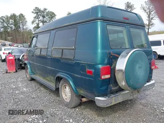 1995 Chevrolet Chevy Van z VIN 1GBEG25K0SF243254, wystawiony jako IAAI lot #41915622 z przebiegiem 74 262 mil mil oraz . Historia ofert i sprzedaży dostępna na DreamBid. Obrazek 3.