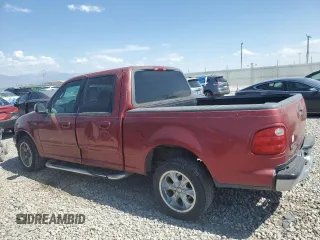 2001 Ford F-150 XLT with VIN 1FTRW07W71KE22482, listed as a Copart auction lot 62546815 with 218,501 mi miles and Clean title. Bid and sale history available at DreamBid. Image 2.