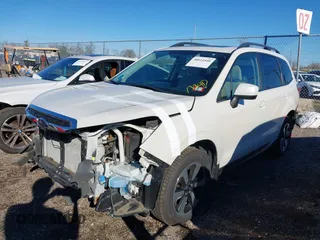 2018 Subaru Forester Premium with VIN JF2SJAGC7JH494972, listed as a IAAI auction lot 40811840 with 65,239 mi miles and . Bid and sale history available at DreamBid. Image 18.