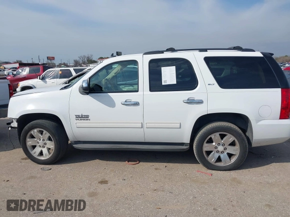 2011 GMC Yukon SLT with VIN 1GKS1CE03BR347941, listed as a IAAI auction lot 41637343 with 198,830 mi miles. Bid and sale history available at carsss.com. Image 15.