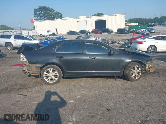 2012 Ford Fusion SE with VIN 3FAHP0HA8CR404010, listed as a IAAI auction lot 42558110 with 215,462 mi miles and . Bid and sale history available at DreamBid. Image 13.