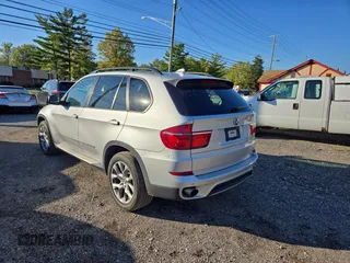 2011 BMW X5 35i with VIN 5UXZV4C54BL410887, listed as a Copart auction lot 77017594 with 111,629 mi miles and Clean Title. Bid and sale history available at carsss.com. Image 3.