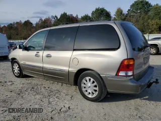 2002 Ford Windstar LTD with VIN 2FMDA58402BB70357, listed as a Copart auction lot 82145564 with 163,065 mi miles and Salvage Title. Bid and sale history available at carsss.com. Image 2.