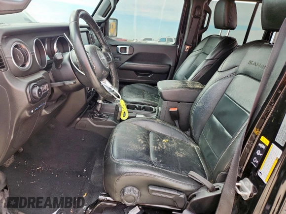 2022 Jeep Wrangler Unlimited Sahara with VIN 1C4JJXP61NW170425, listed as a Copart auction lot 60683715 with 51,847 mi miles and Salvage title. Bid and sale history available at DreamBid. Image 7.