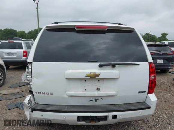 2011 Chevrolet Tahoe LT with VIN 1GNSCBE0XBR256687, listed as a IAAI auction lot 41948765 with 232,954 mi miles and . Bid and sale history available at DreamBid. Image 16.
