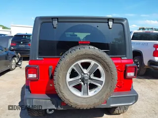2019 Jeep Wrangler Unlimited Sahara with VIN 1C4HJXEG7KW551864, listed as a IAAI auction lot 42170875 with 115,695 mi miles and . Bid and sale history available at DreamBid. Image 15.