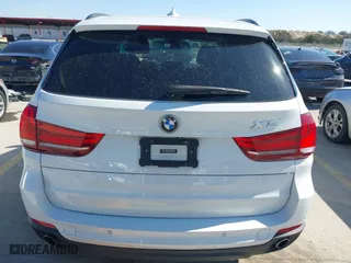 2016 BMW X5 xDrive35i with VIN 5UXKR0C56G0P34365, listed as a IAAI auction lot 41588869 with 105,250 mi miles. Bid and sale history available at carsss.com. Image 16.