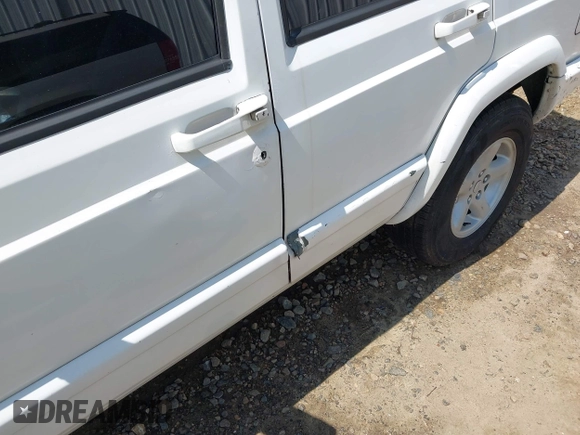 2001 Jeep Cherokee Sport with VIN 1J4FT48S71L503551, listed as a IAAI auction lot 42660835 with Not provided miles and . Bid and sale history available at DreamBid. Image 13.