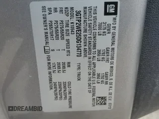 2013 GMC Sierra 1500 SLT with VIN 3GTP2WE25DG134770, listed as a Copart auction lot 59616535 with 212,304 mi miles and Salvage title. Bid and sale history available at DreamBid. Image 12.