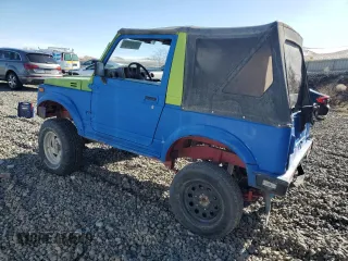 1986 Suzuki Samurai z VIN JS4JC51C8G4114216, wystawiony jako Copart lot #46191465 z przebiegiem 67 177 mil mil oraz Tytuł czysty. Historia ofert i sprzedaży dostępna na DreamBid. Obrazek 2.