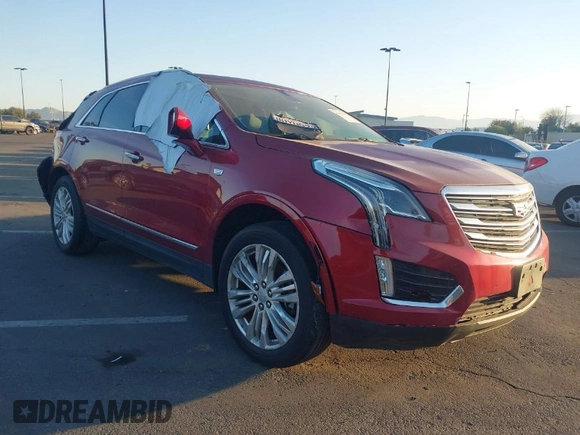 2019 Cadillac XT5 Premium Luxury FWD with VIN 1GYKNERS4KZ174349, listed as a IAAI auction lot 41614364 with 104,979 mi miles and . Bid and sale history available at DreamBid. Image 1.