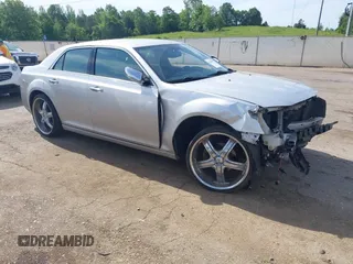 2012 Chrysler 300 Limited z VIN 2C3CCACG6CH309673, wystawiony jako IAAI lot #42161369 z przebiegiem 213 369 mil mil oraz . Historia ofert i sprzedaży dostępna na DreamBid. Obrazek 1.