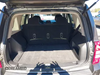 2014 Jeep Patriot Latitude with VIN 1C4NJRFB3ED886007, listed as a IAAI auction lot 41285963 with 127,007 mi miles and . Bid and sale history available at DreamBid. Image 8.