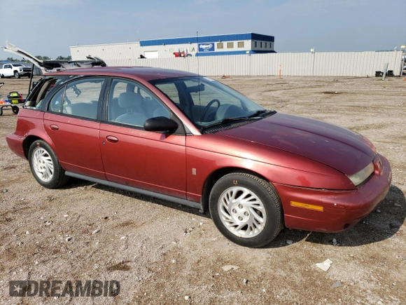 1999 Saturn SW z VIN 1G8ZK827XXZ348270, wystawiony jako Copart lot #67872244 z przebiegiem 110 936 mil mil oraz Szkody całkowita. Historia ofert i sprzedaży dostępna na DreamBid. Obrazek 4.