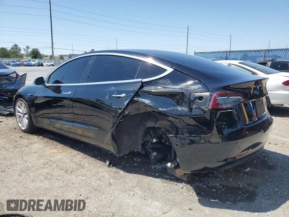 2019 Tesla Model 3 Mid Range z VIN 5YJ3E1EA9KF314143, wystawiony jako Copart lot #53564335 z przebiegiem 77 168 mil mil oraz Szkoda całkowita • Salvage title. Historia ofert i sprzedaży dostępna na DreamBid. Obrazek 2.