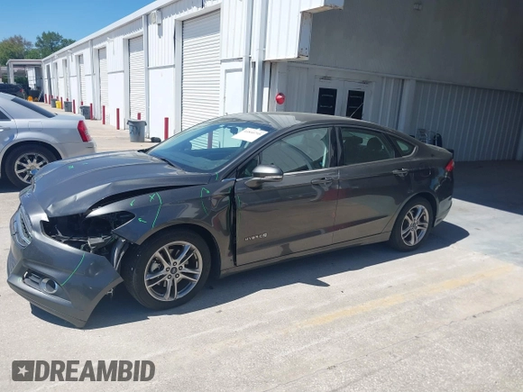 2016 Ford Fusion SE Hybrid with VIN 3FA6P0LU3GR127121, listed as a IAAI auction lot 41840795 with 88,281 mi miles. Bid and sale history available at carsss.com. Image 15.