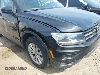 2020 Volkswagen Tiguan S with VIN 3VV1B7AX1LM086019, listed as a IAAI auction lot 42458434 with 114,413 mi miles and . Bid and sale history available at DreamBid. Image 19.