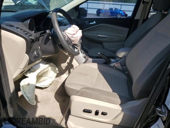 2016 Ford Escape SE with VIN 1FMCU9G93GUA77437, listed as a Copart auction lot 51807905 with 128,261 mi miles and Salvage Title. Bid and sale history available at DreamBid. Image 7.