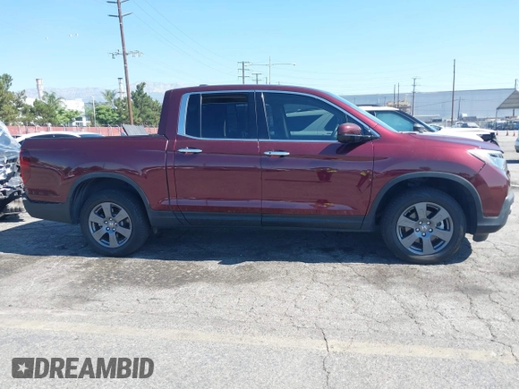 2020 Honda Ridgeline RTL-E with VIN 5FPYK3F7XLB014875, listed as a IAAI auction lot 42620537 with 41,919 mi miles and . Bid and sale history available at DreamBid. Image 14.