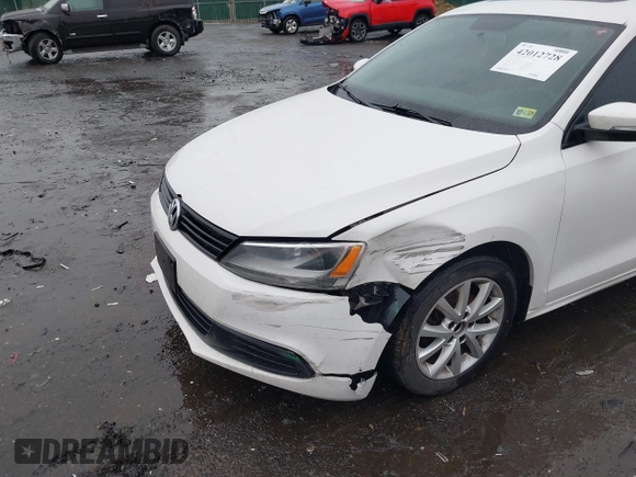2011 Volkswagen Jetta Sedan SE w/Convenience & Sunroof PZEV with VIN 3VWDZ7AJ4BM385356, listed as a IAAI auction lot 42012728 with 169,045 mi miles. Bid and sale history available at carsss.com. Image 6.