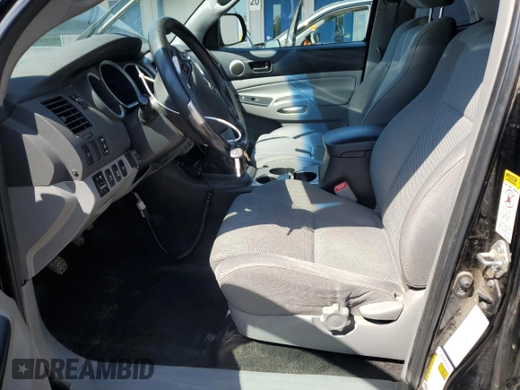 2014 Toyota Tacoma with VIN 5TFUU4EN3EX102005, listed as a Copart auction lot 56366605 with 179,950 mi miles and Salvage Title. Bid and sale history available at DreamBid. Image 7.