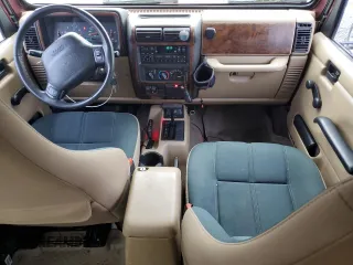 2001 Jeep Wrangler Sahara z VIN 1J4FA59SX1P305100, wystawiony jako Copart lot #58606685 z przebiegiem 76 856 mil mil oraz Czysty tytuł • Clean title. Historia ofert i sprzedaży dostępna na DreamBid. Obrazek 8.