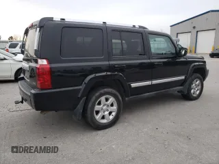 2007 Jeep Commander Overland with VIN 1J8HG68247C557731, listed as a Copart auction lot 87964795 with 174,195 mi miles and Salvage title. Bid and sale history available at DreamBid. Image 3.