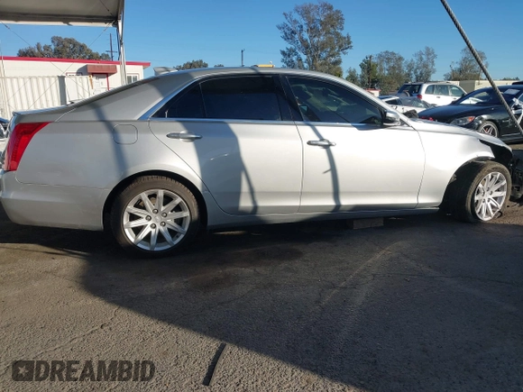 2015 Cadillac CTS AWD z VIN 1G6AW5SX2F0104981, wystawiony jako IAAI lot #41276740 z przebiegiem 87 128 mil mil oraz . Historia ofert i sprzedaży dostępna na DreamBid. Obrazek 13.