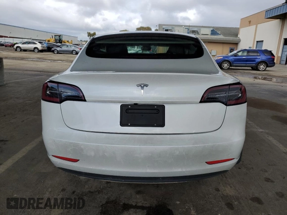 2023 Tesla Model 3 with VIN 5YJ3E1EA7PF488316, listed as a Copart auction lot 49655325 with 60,589 mi miles and Salvage Title. Bid and sale history available at DreamBid. Image 6.