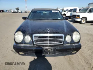 1998 Mercedes-Benz E-Class with VIN WDBJF65F4WA646422, listed as a Copart auction lot 88982785 with 281,524 mi miles and Salvage Title. Bid and sale history available at carsss.com. Image 5.