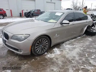 2011 BMW 7 Series 740Li with VIN WBAKB4C54BC574892, listed as a IAAI auction lot 41165432 with 115,489 mi miles. Bid and sale history available at carsss.com. Image 16.