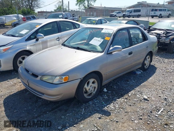 1998 Toyota Corolla VE z VIN 2T1BR18E2WC019524, wystawiony jako IAAI lot #41997009 z przebiegiem 255 968 mil mil oraz . Historia ofert i sprzedaży dostępna na DreamBid. Obrazek 2.