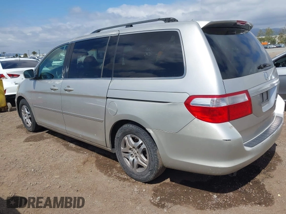 2005 Honda Odyssey EX-L with VIN 5FNRL38655B002926, listed as a IAAI auction lot 42137025 with 209,863 mi miles. Bid and sale history available at carsss.com. Image 3.