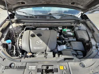 2019 Mazda CX-5 Grand Touring with VIN JM3KFADM2K1637664, listed as a Copart auction lot 63400975 with 45,663 mi miles and Salvage title. Bid and sale history available at DreamBid. Image 12.