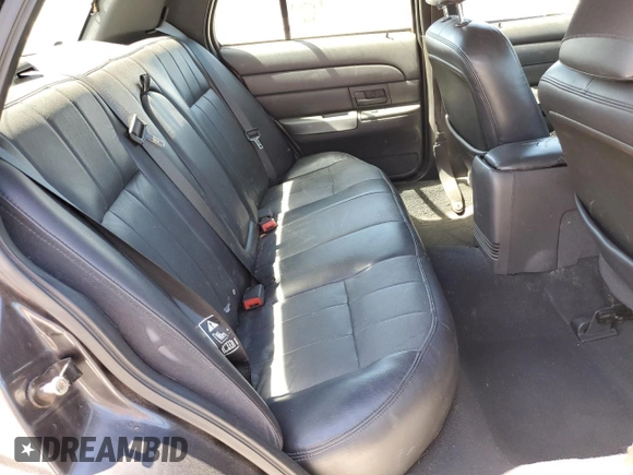 2004 Ford Crown Victoria LX z VIN 2FAFP74W44X112942, wystawiony jako Copart lot #50484665 z przebiegiem 248 480 mil mil oraz Szkoda całkowita • Salvage title. Historia ofert i sprzedaży dostępna na DreamBid. Obrazek 11.