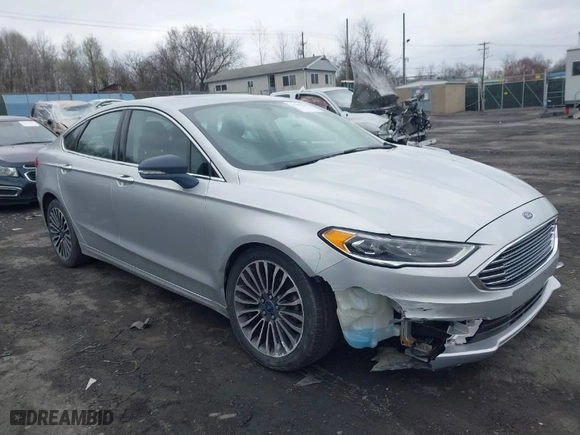 2018 Ford Fusion Titanium with VIN 3FA6P0D99JR139114, listed as a IAAI auction lot 41991248 with 142,324 mi miles. Bid and sale history available at carsss.com. Image 1.