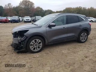 2021 Ford Escape SEL Hybrid z VIN 1FMCU9CZ5MUA52234, wystawiony jako Copart lot #82543484 z przebiegiem 68 160 mil mil oraz Szkoda całkowita • Salvage title. Historia ofert i sprzedaży dostępna na DreamBid. Obrazek 1.