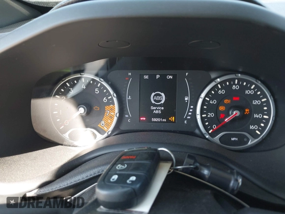 2020 Jeep Renegade Latitude with VIN ZACNJAB10LPM09870, listed as a IAAI auction lot 42063390 with 59,201 mi miles. Bid and sale history available at carsss.com. Image 7.