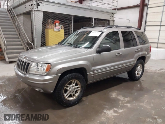 1999 Jeep Grand Cherokee Limited with VIN 1J4GW68N7XC752314, listed as a IAAI auction lot 41776905 with 228,023 mi miles. Bid and sale history available at carsss.com. Image 19.