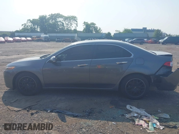 2009 Acura TSX z VIN JH4CU26609C033244, wystawiony jako IAAI lot #42400966 z przebiegiem 80 487 mil mil oraz . Historia ofert i sprzedaży dostępna na DreamBid. Obrazek 13.